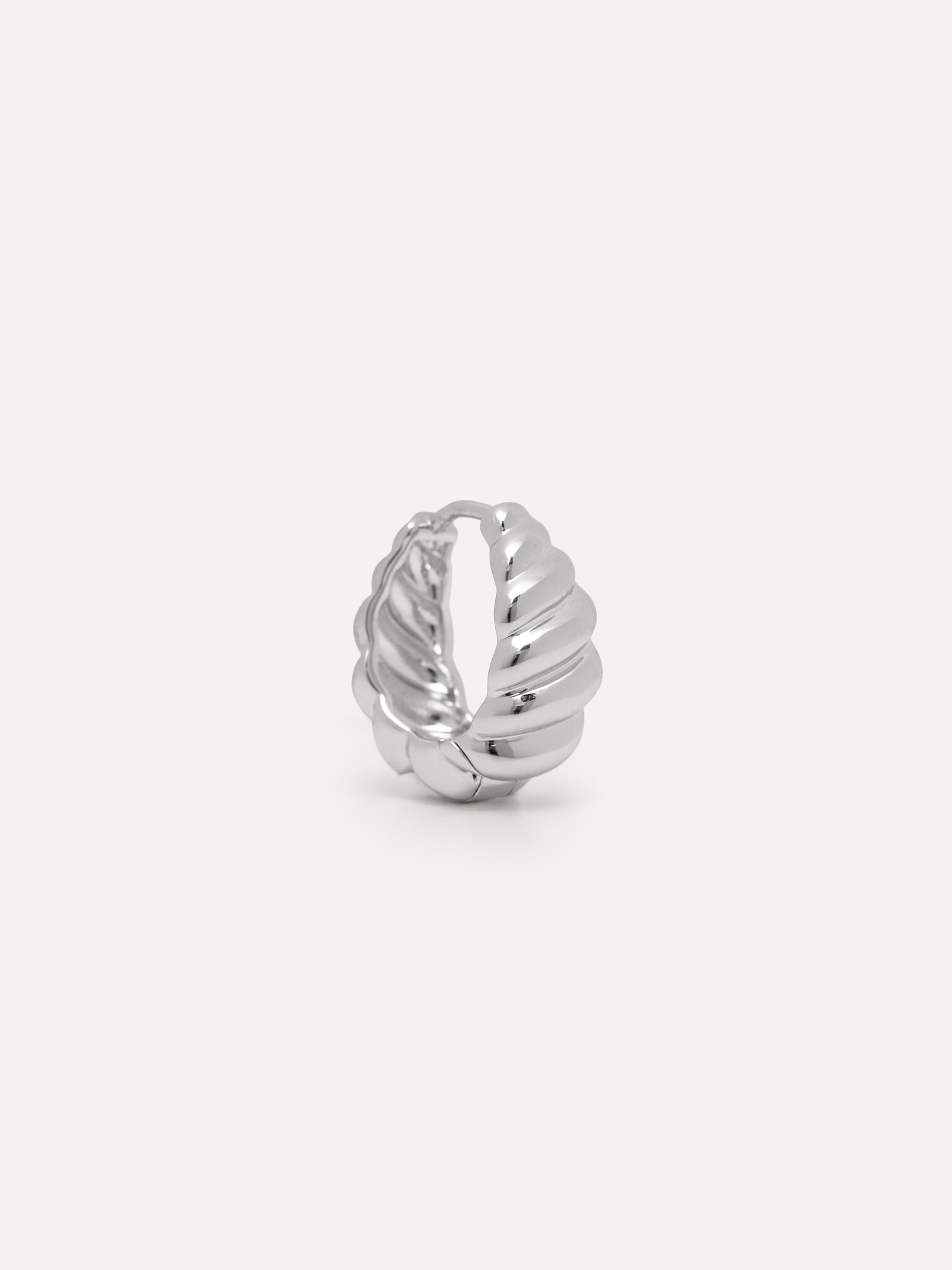 Les Soeurs Earring Jazz Croissant 2. Parisian chic! This croissant earring in silver combines elegant curves with a luxur...