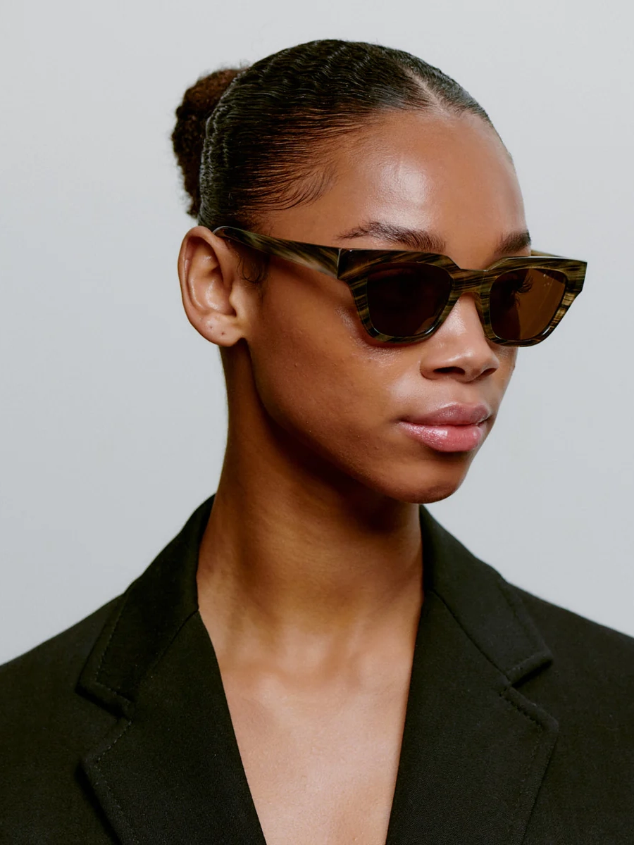 A.Kjaerbede Sunglasses Kaws 2. Coffee date or beach stroll? With these sunglasses, you can do both. The marbled frame loo...