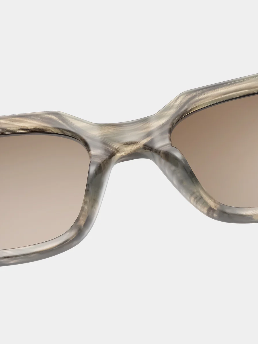 A.Kjaerbede Sunglasses Kaws 4. Coffee date or beach stroll? With these sunglasses, you can do both. The marbled frame loo...