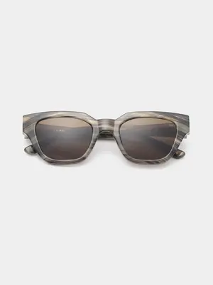 Sunglasses Kaws. Coffee date or beach stroll? With these sunglasses, you can do both. The marbled frame looks chic withou...