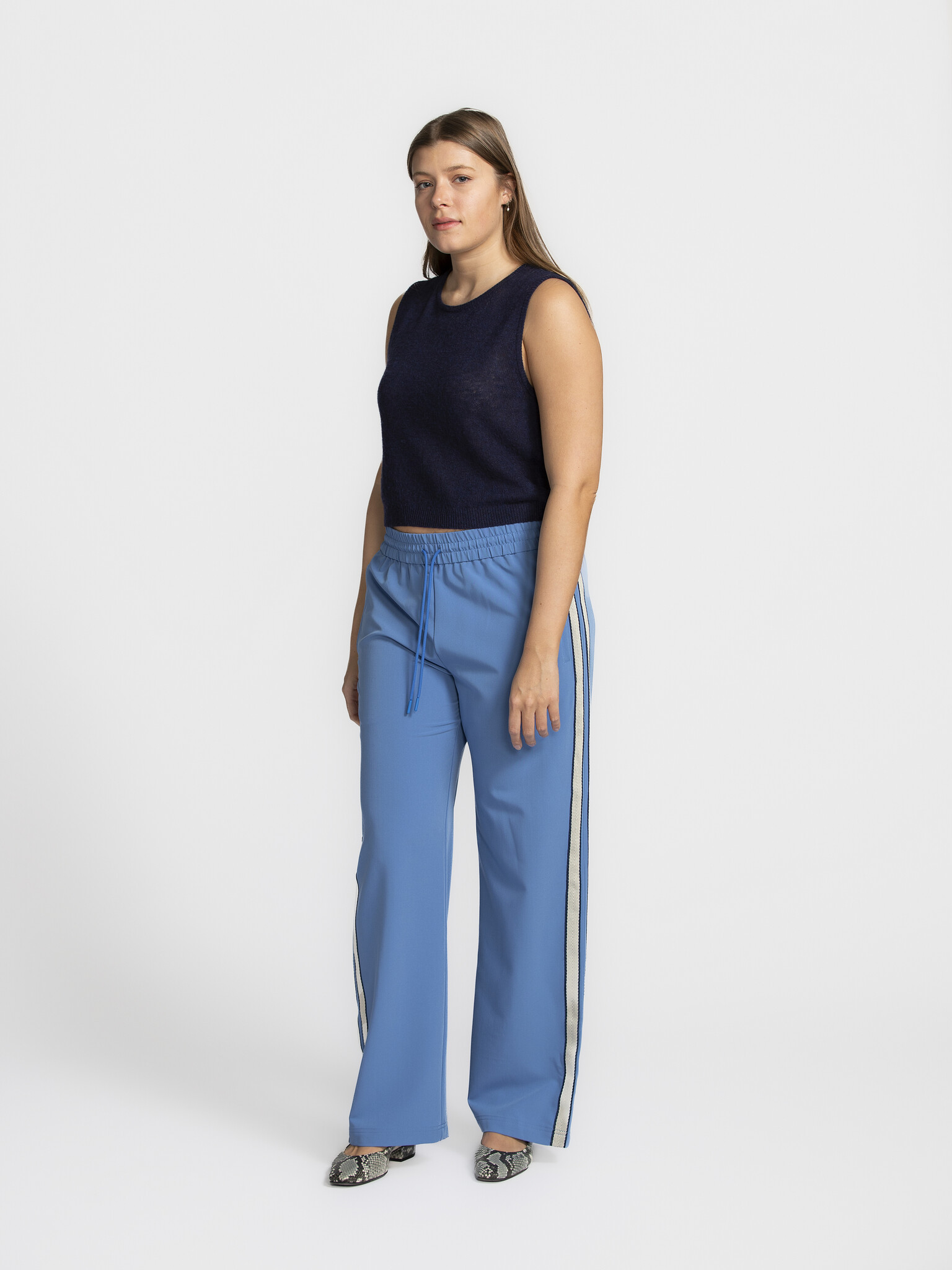 MBYM Trousers Livigno Franky 1. Track star! Who said sporty couldn't be chic? These track pants combine elegant blue with...