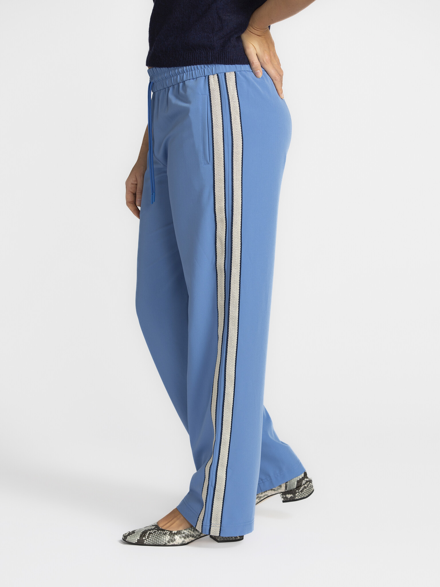 MBYM Trousers Livigno Franky 3. Track star! Who said sporty couldn't be chic? These track pants combine elegant blue with...