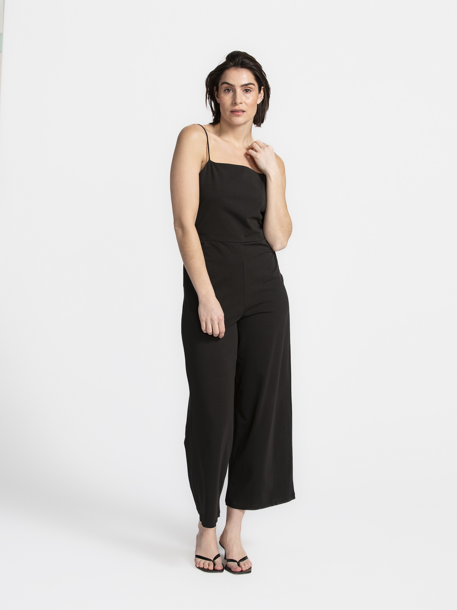 Edited Jumpsuit Noor 1. Minimalistic in the front, party in the back! This jumpsuit lets your back do the talking with st...