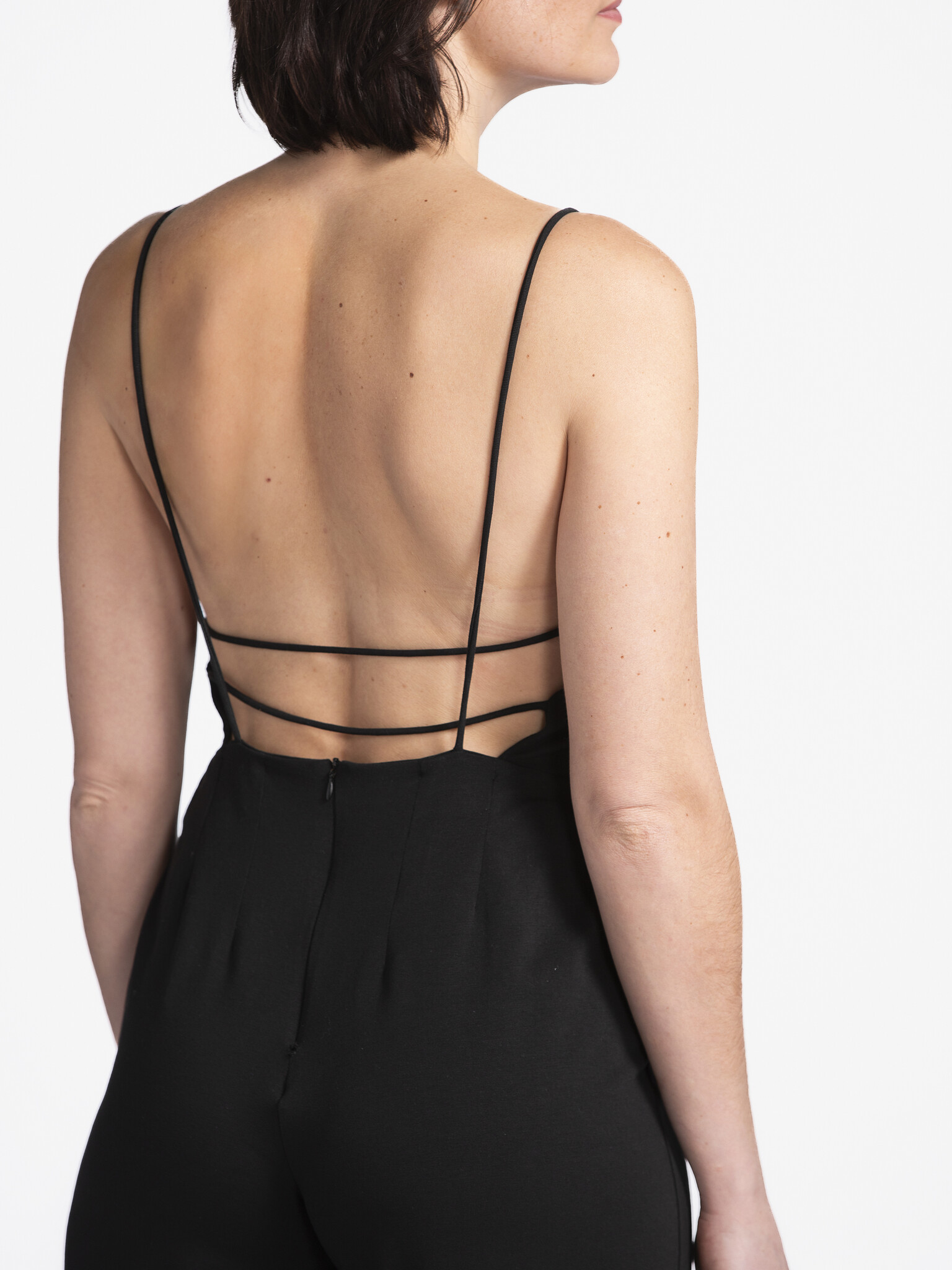 Edited Jumpsuit Noor 3. Minimalistic in the front, party in the back! This jumpsuit lets your back do the talking with st...