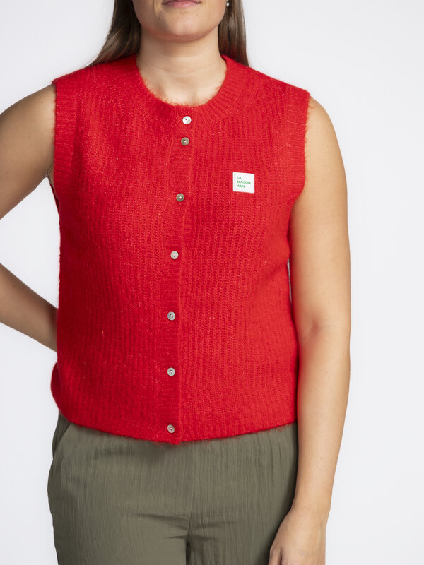 American Vintage Vest East 5. Refresh your look with this sleeveless knitted vest in a vibrant bright red shade, perfect ...