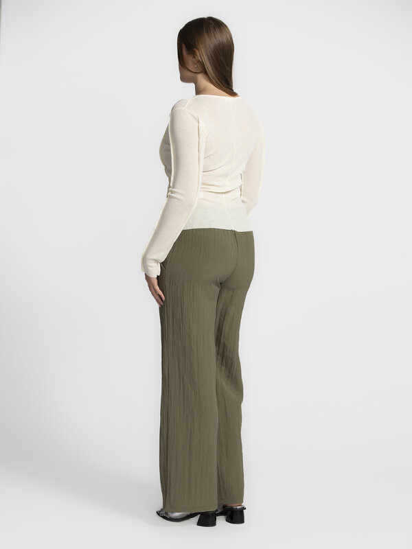 Edited Longsleeve top Halima 4. Cream dream! Looking for a top that subtly stands out? This one has it all: decorative ve...