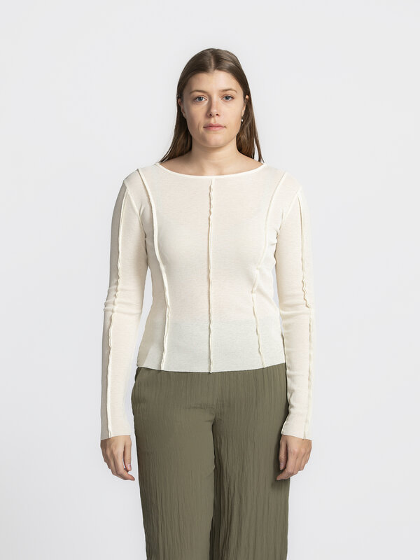 Edited Longsleeve top Halima 3. Cream dream! Looking for a top that subtly stands out? This one has it all: decorative ve...