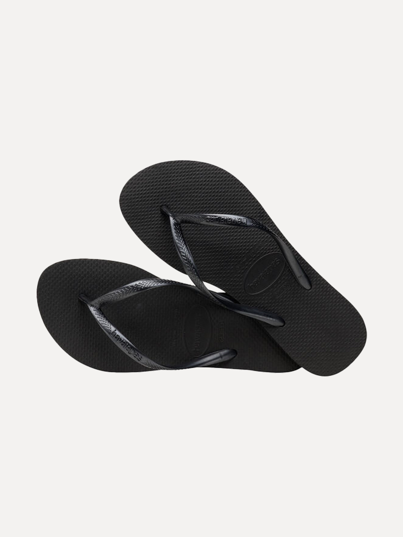 Havaianas Slim 4. Deze zwarte Havaianas zijn je zomerse must-have! Anders dan gewone teenslippers bieden ze langdurig dra...