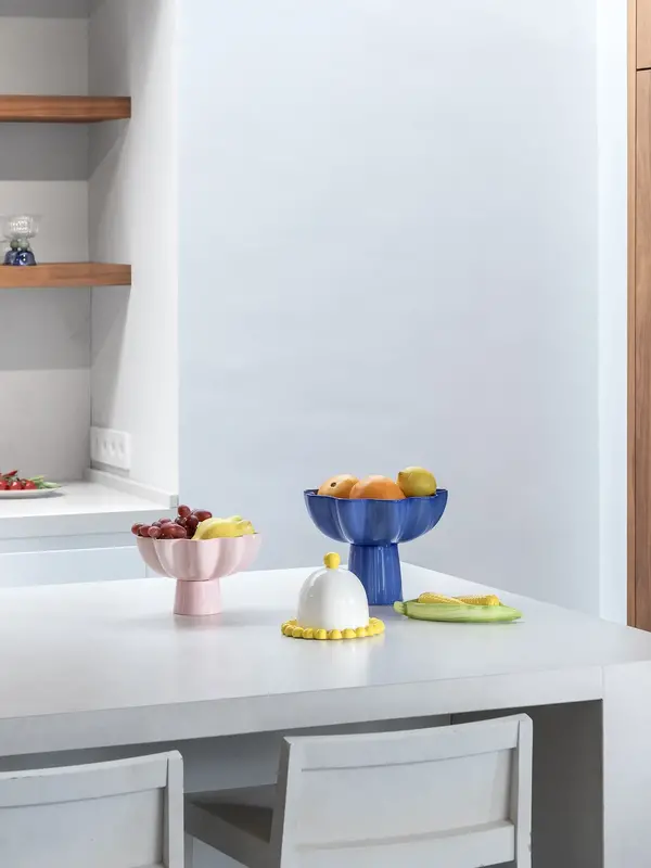 &klevering Kom Sun 3. Deze verhoogde fruitkom is het middelpunt van elke tafel. Hij presenteert je dagelijkse vitamines a...