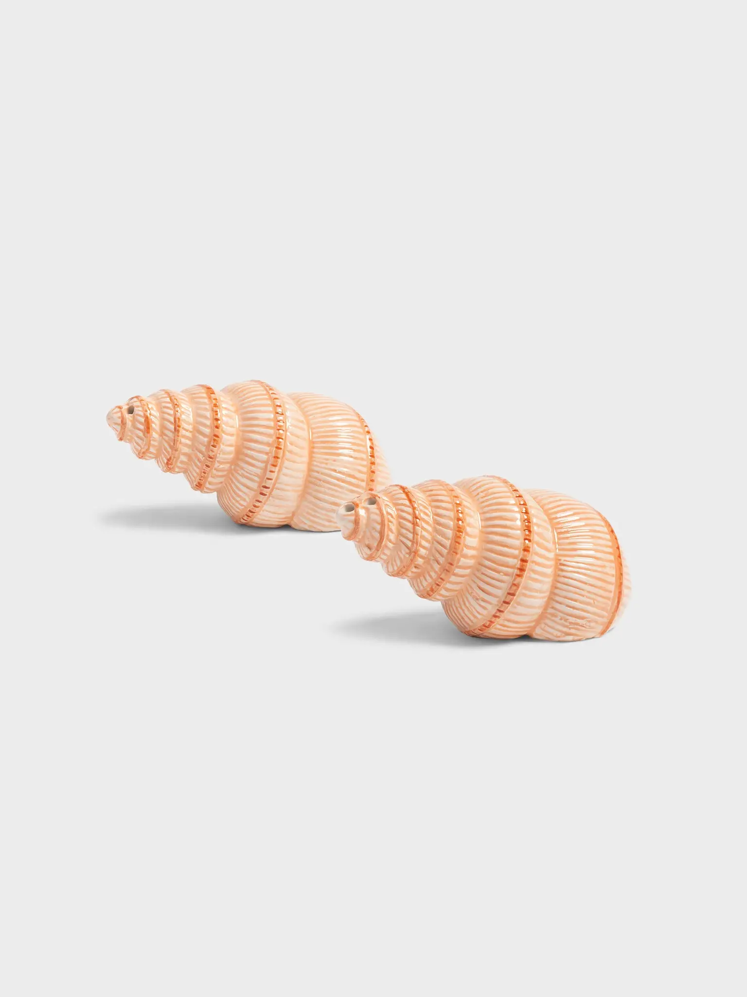 &klevering Salt & pepper shakers Shell 1. Sea you at dinner? This shell-shaped salt & pepper set brings beach vibes to yo...