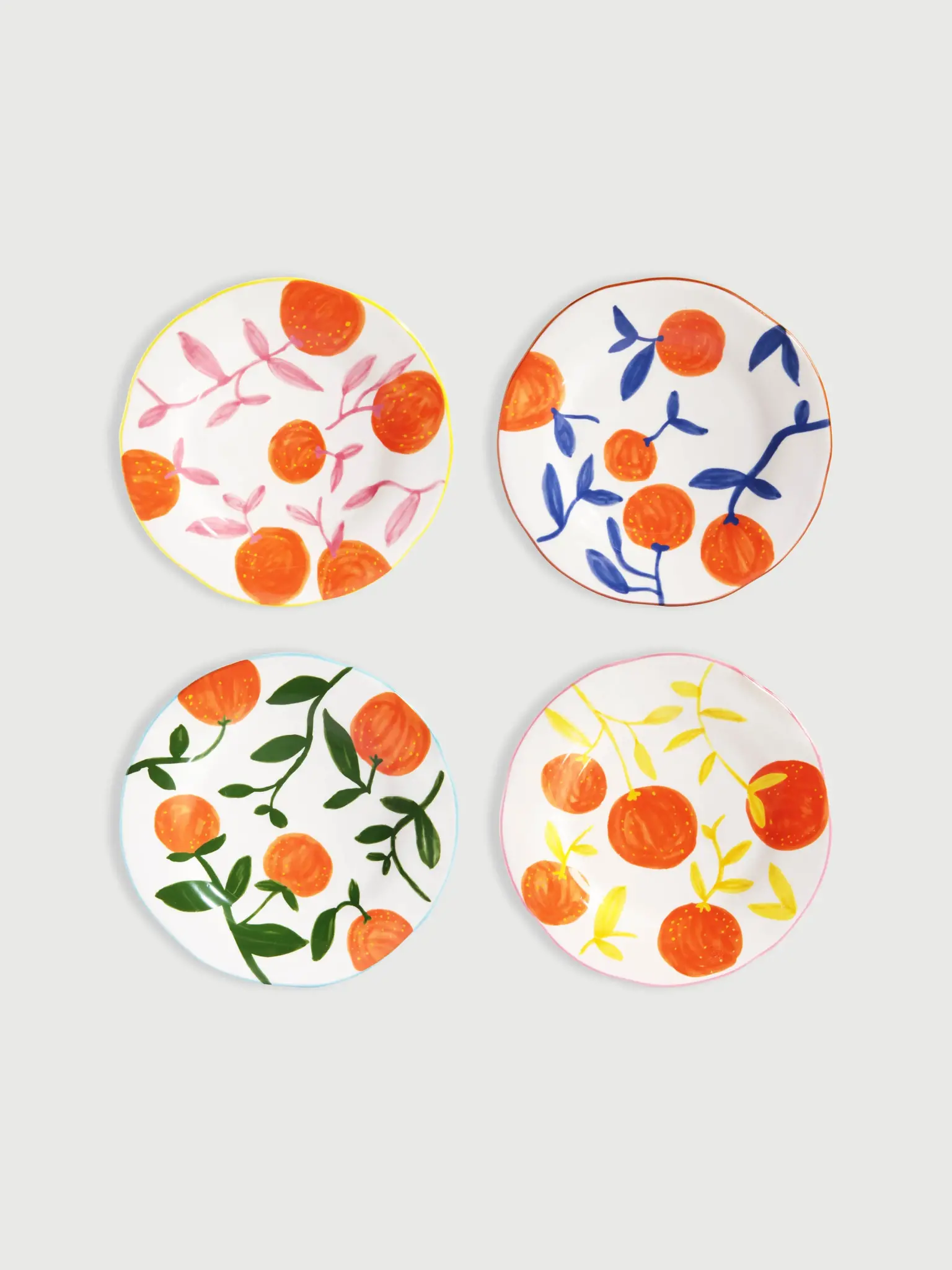 &klevering Bordenset Orange 1. Deze set van 4 handgeschilderde bordjes brengt de zomer naar je tafel, ongeacht het seizoe...
