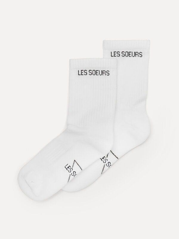 Les Soeurs Sport socks Les Soeurs 1. Feet treat! These iconic white sports socks with the Les Soeurs logo blend comfort a...