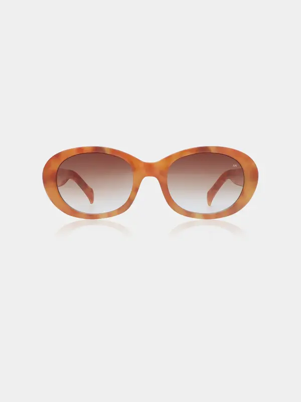 A.Kjaerbede Sunglasses Anma 1. Oval is in! With its amber-toned frame and smoked lenses, this ANMA pair adds just the rig...