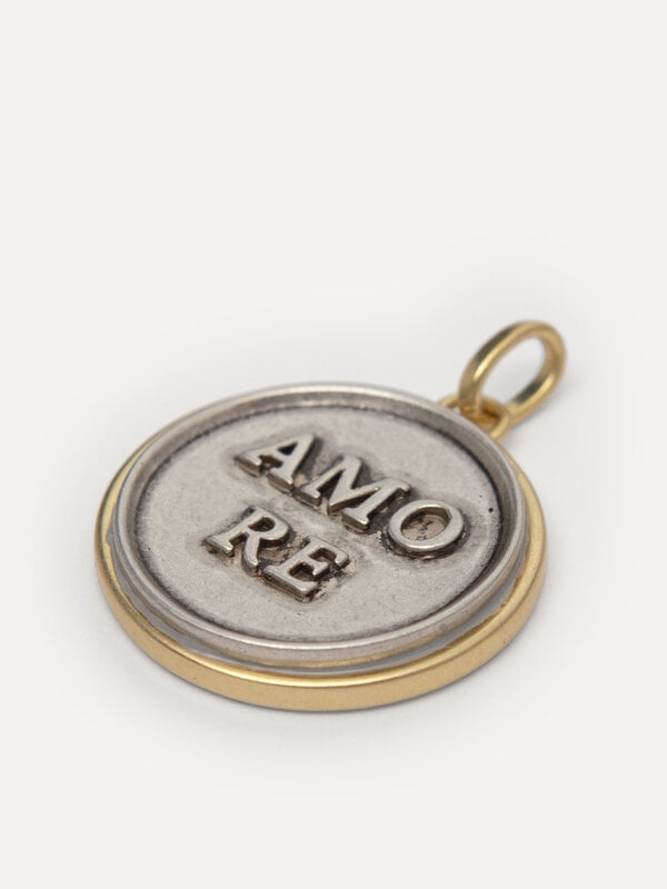 Les Soeurs Charm Amore 2. That’s Amore – this round charm with AMORE lettering is a tribute to love. The gold-silver comb...