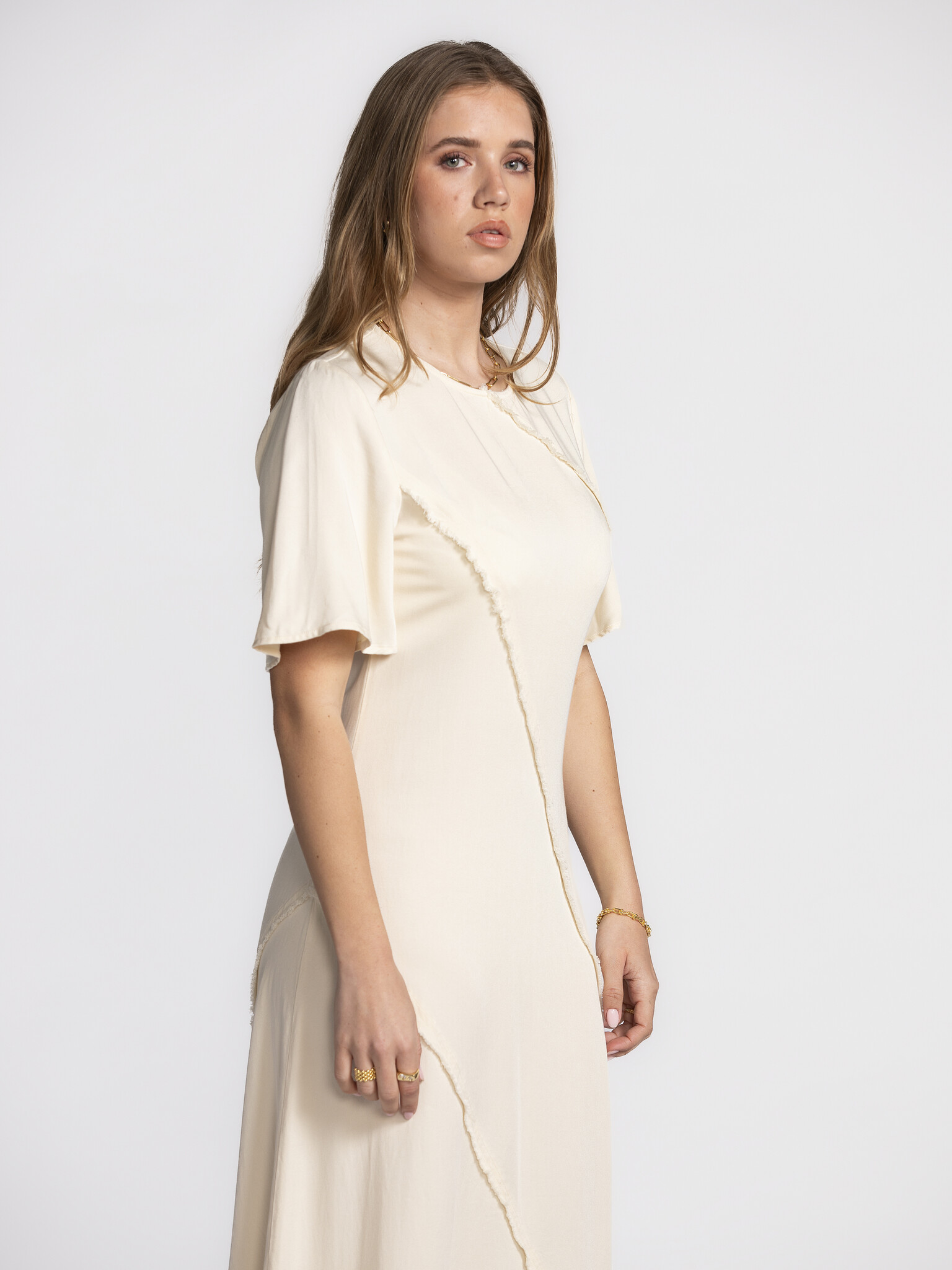 Selected Ankle Dress Ivana 3. Dream in cream! This long cream-colored ankle dress with raw edges is what dreams are made ...