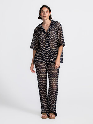 Broek Finn. Easy breezy - Deze luchtige, semitransparante gehaakte broek is perfect voor zonnige stranddagen over je favo...