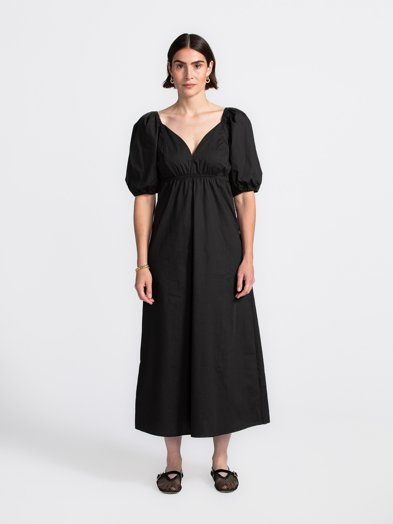 Edited Maxi dress Senta 1. Black elegance — this dress always fits the moment. This black cotton maxi dress is the defini...