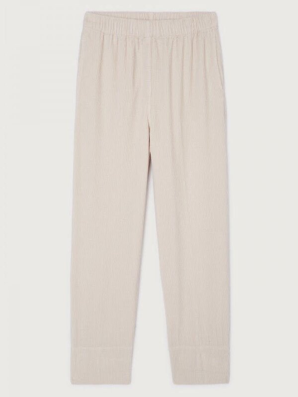 American Vintage Ribbed pants Padow 1. Effortless in ecru. This loose-fit corduroy trouser with high waist blends comfort...