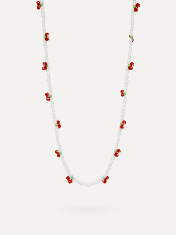 Les Soeurs Beaded necklace Ana Cherries 1. Cherry vibes only. This fun necklace with white beads and red cherries adds a ...