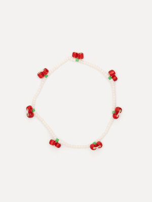 Bracelet Lea. Charme cerise au poignet ! Ce bracelet délicat avec perles blanches et cerises rouges apporte une touche lu...