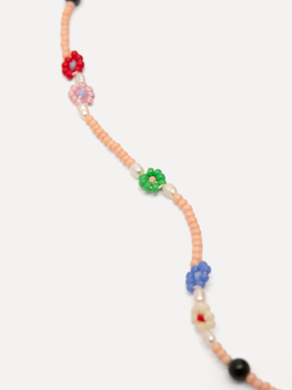 Les Soeurs Necklace Alba 3. A daisy a day keeps the blues away. This delicate pearl necklace with playful flower details ...
