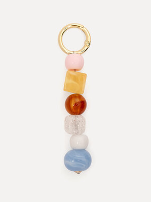 Bag Charm. Onze favoriete bag charm keert terug in een frisse, zomerse update. Met glanzende pastelkleurige stenen in zac...