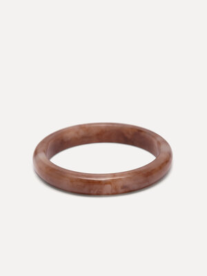 Resin bangle bracelet. Banglin’ beauty. This round bangle in a warm marsala hue adds color and character to your look. Th...