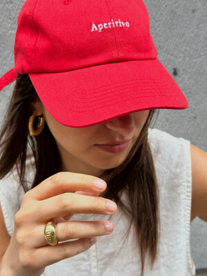 Cap Poppy Aperitivo. This bold red cap with 'Aperitivo' embroidery brings instant summer vibes. Wear it with your favorit...