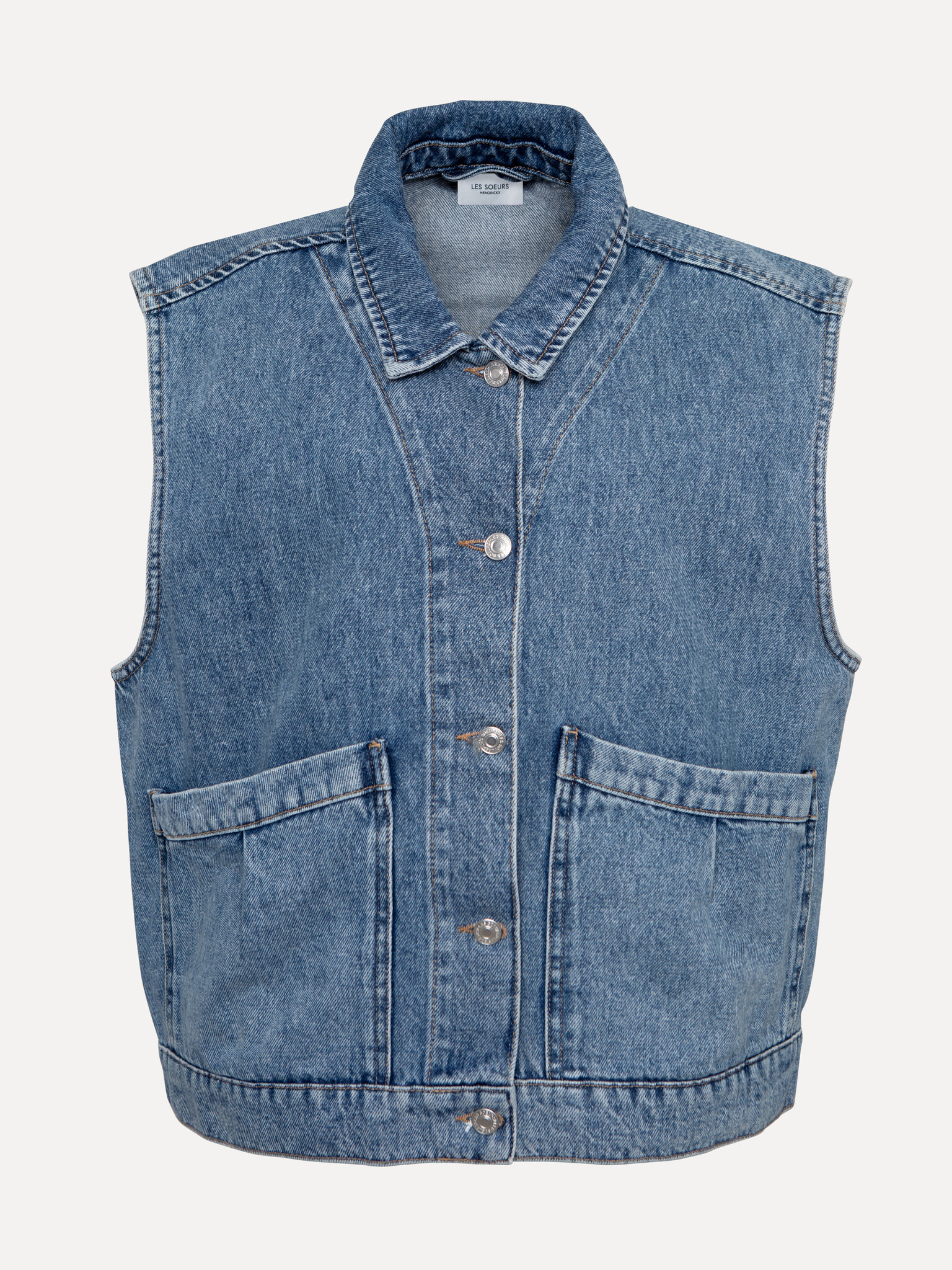 Les Soeurs Sleeveless vest Meo 2. Denim with a twist. This sleeveless denim vest with an oversized fit is the perfect lay...