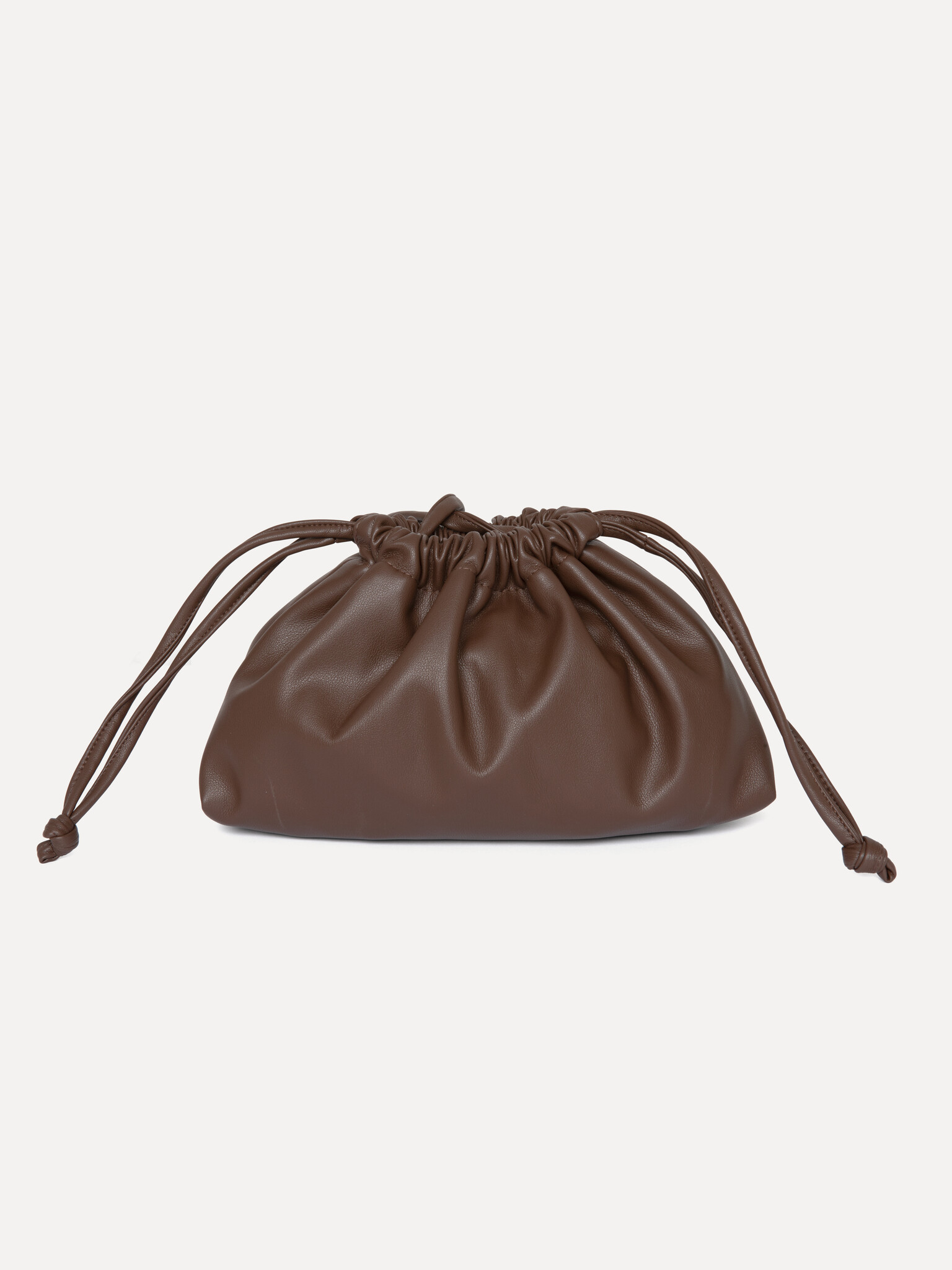 Les Soeurs Pochette Carly 1. Dark brown, done chic. Cette pochette en cuir vegan brun foncé respire l'élégance discrète. ...