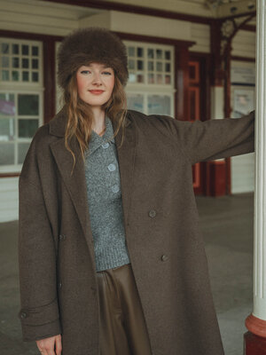 Hat Pola. Fluffy favourite - This dark brown faux fur hat adds instant glamour to your winter looks. Delightfully soft, s...