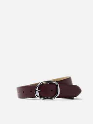 Ceinture Feline. Un détail discret mais marquant. Cette ceinture couleur figue se distingue par sa boucle ronde argentée ...
