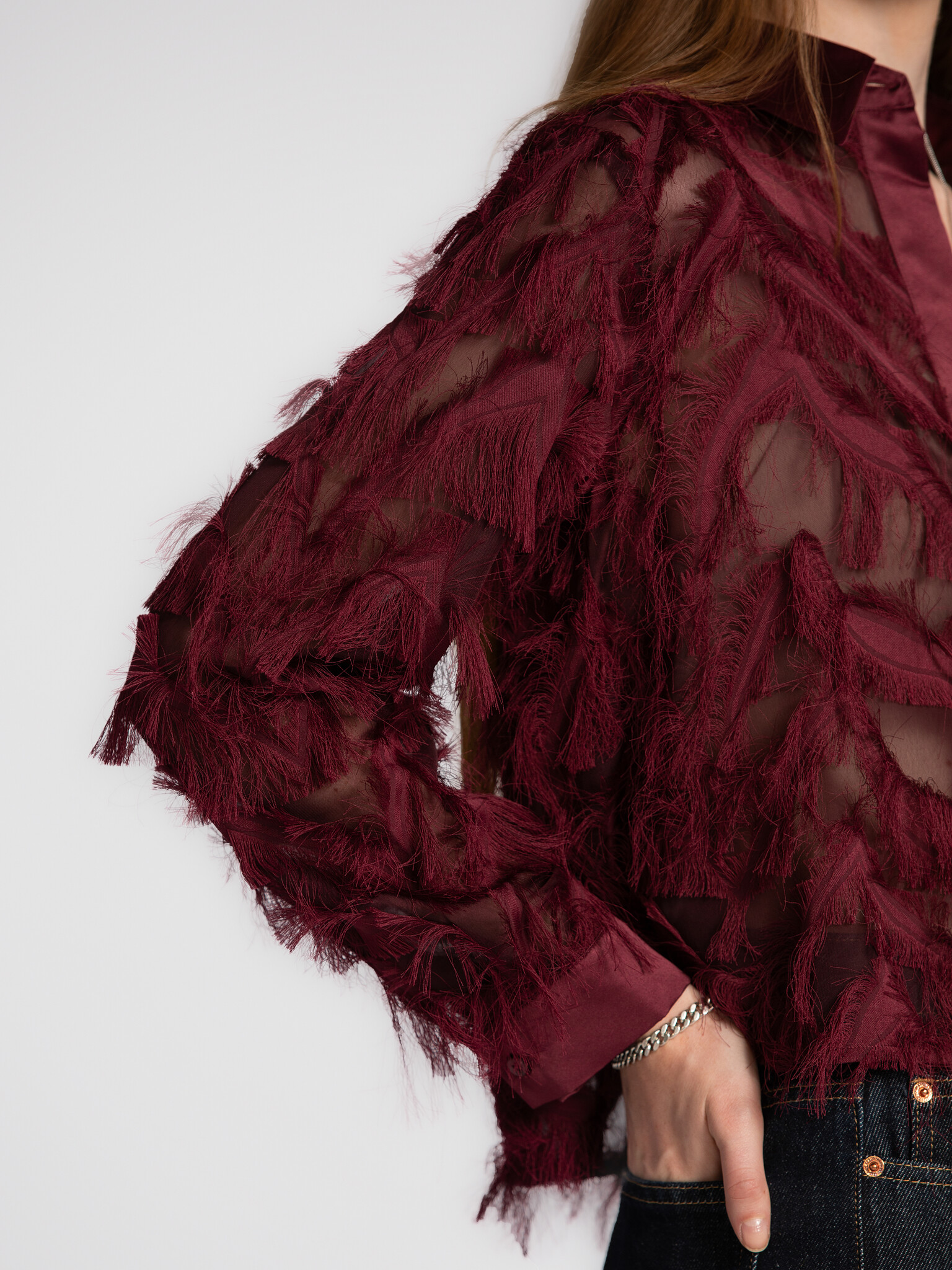 Selected Chemise courte Myline 5. Chemise courte dans une teinte figue intense et au look plume duveteux. Sa texture ludi...