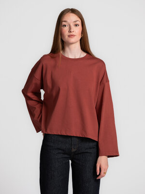T-shirt à manches longues Aline. Adieu, les basiques ennuyeux! Ce haut à manches larges dans une luxuriante teinte bordea...