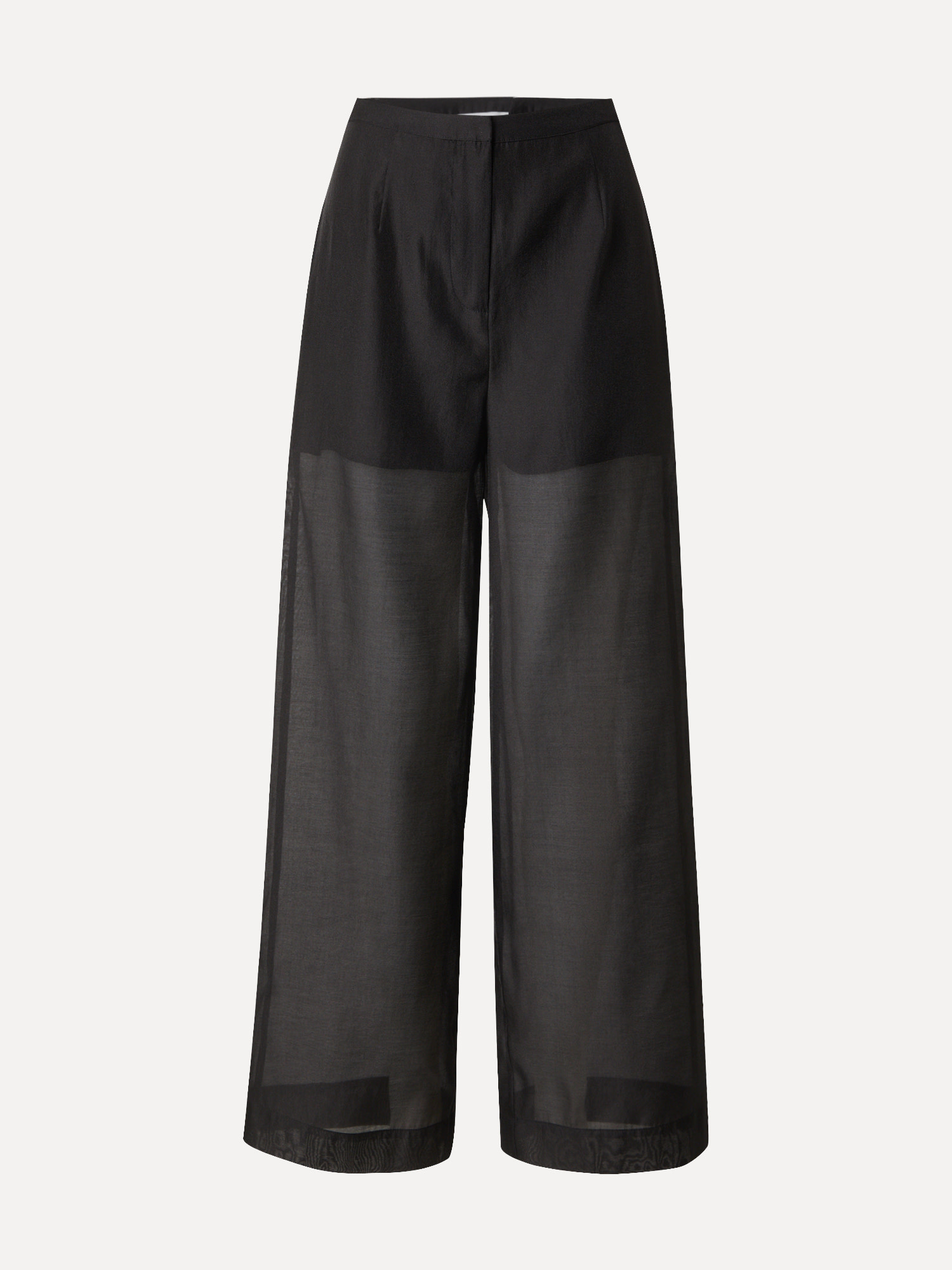 Edited Transparante broek Pernilla 2. Deze zwarte, semi-transparante pantalon is jouw go-to voor een city chic vibe of ee...