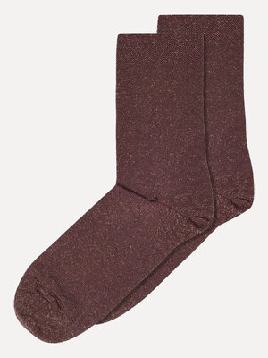 Chaussettes Lucina. Step into shimmer. Apportez une touche de brillance aux journées automnales avec ces chaussettes bord...