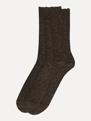 Chaussettes Julia. Warm shimmer. Ces chaussettes pailletées brun foncé sont vos favorites de l’automne. Leur éclat subtil...