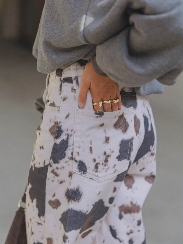 Les Soeurs Cow print jeans Chuck 6. Spotted in style. The cow print is back, straight from the runway to your wardrobe. T...