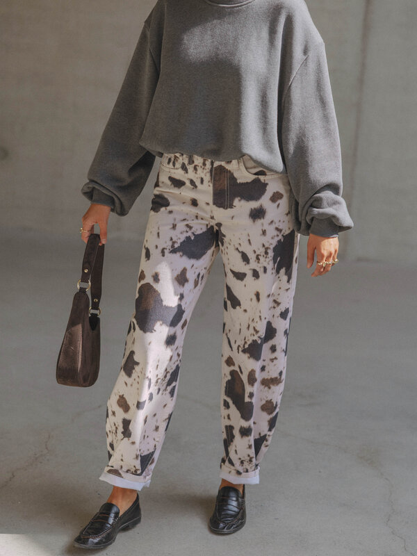 Les Soeurs Cow print jeans Chuck 5. Spotted in style. The cow print is back, straight from the runway to your wardrobe. T...