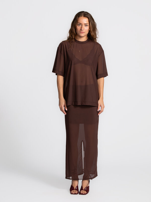 Edited Sheer mesh skirt Ludwine 3. This brown mesh skirt stands out with its semi-sheer fabric and refined finish. Subtle...
