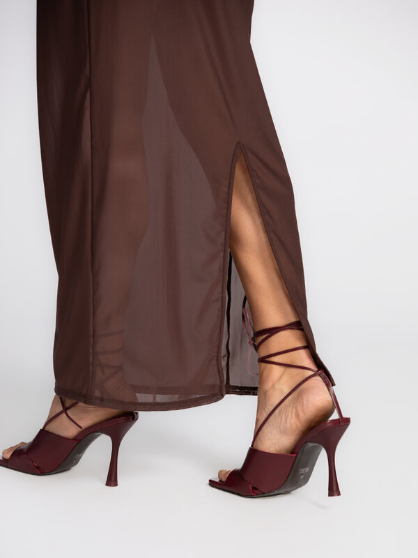 Edited Sheer mesh skirt Ludwine 4. This brown mesh skirt stands out with its semi-sheer fabric and refined finish. Subtle...