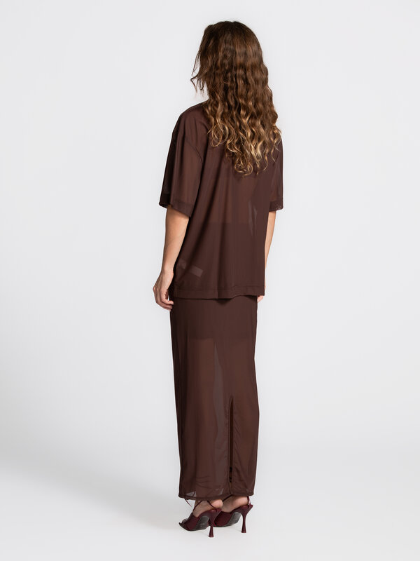 Edited Sheer mesh skirt Ludwine 5. This brown mesh skirt stands out with its semi-sheer fabric and refined finish. Subtle...