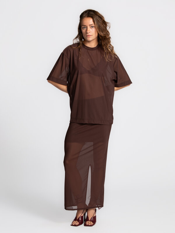 Edited Transparent T-shirt Ulaaka 1. Sheer brown elegance. This dark brown, transparent T-shirt is a true statement piece...