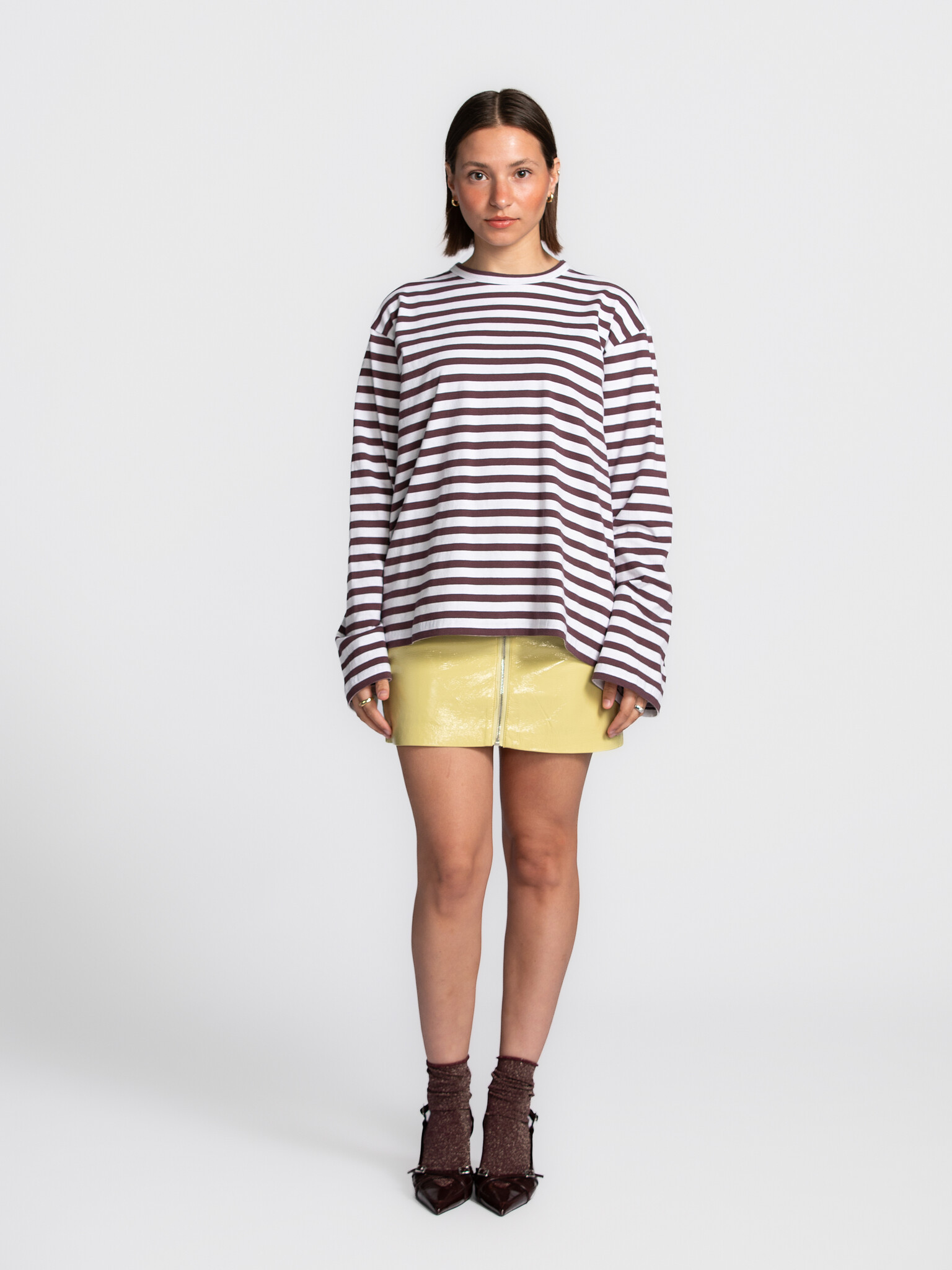 Edited Mini skirt Qeena 3. Let it shine! This yellow mini skirt is the ultimate eye-catcher. Pair with a basic t-shirt an...