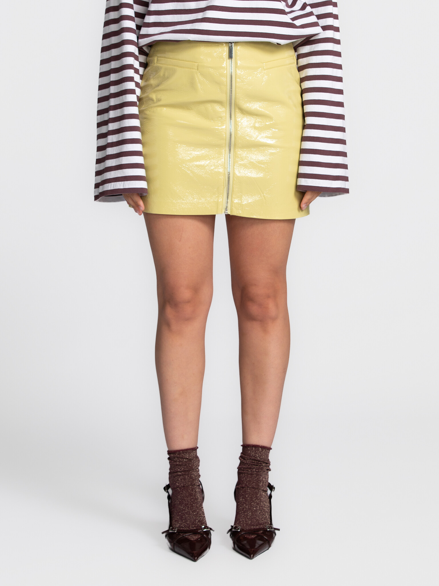 Edited Mini skirt Qeena 1. Let it shine! This yellow mini skirt is the ultimate eye-catcher. Pair with a basic t-shirt an...