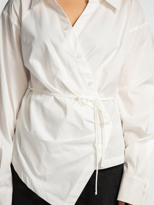 Edited Wrap blouse Lillith 4. Elegant and timeless. This blouse merges a classic button-down style with a modern wrap des...