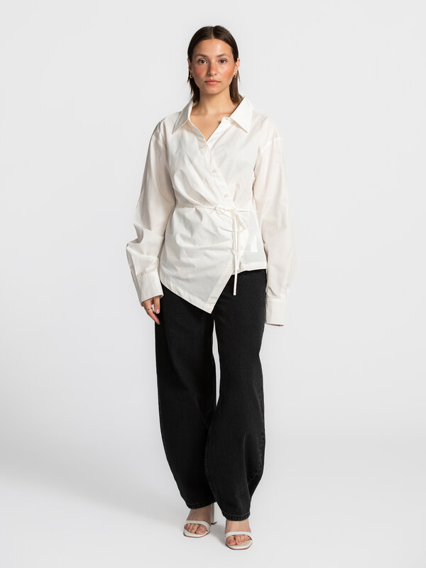 Edited Wrap blouse Lillith 3. Elegant and timeless. This blouse merges a classic button-down style with a modern wrap des...