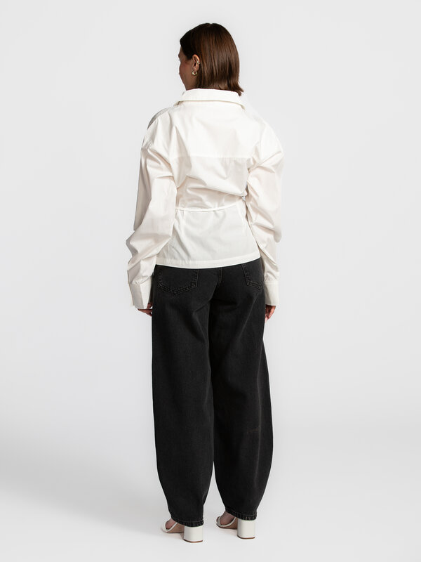 Edited Wrap blouse Lillith 5. Elegant and timeless. This blouse merges a classic button-down style with a modern wrap des...