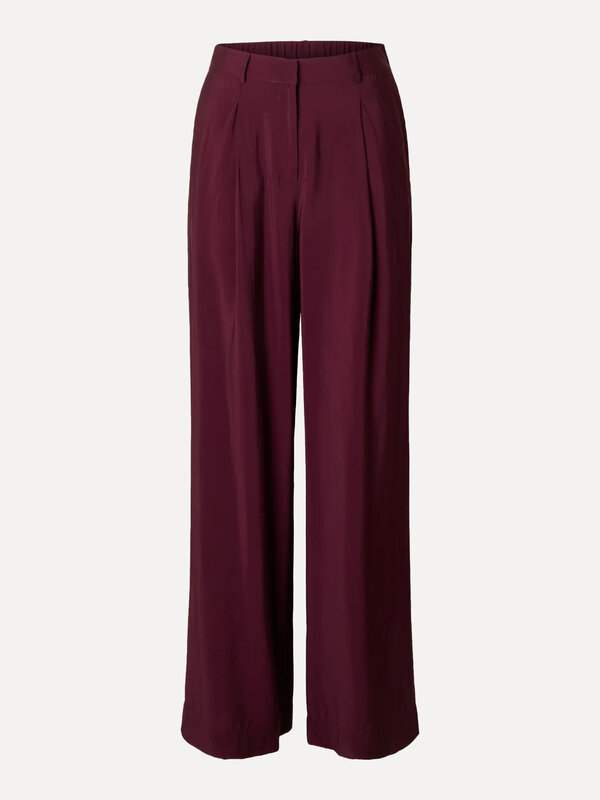 Selected Pantalon large Teresa 2. Elegant & effortless. Ce pantalon bordeaux à jambes larges dégage luxe et style. Idéal ...