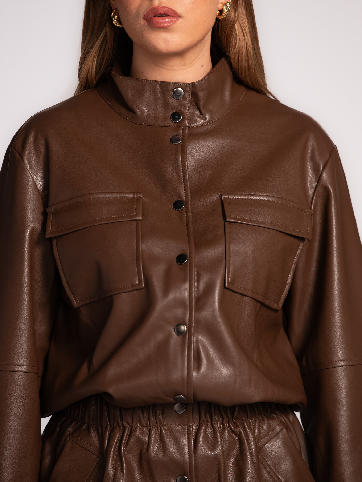 Les Soeurs Vegan leather dress Mitch 4. This brown vegan leather mini dress strikes the perfect balance between edgy and ...